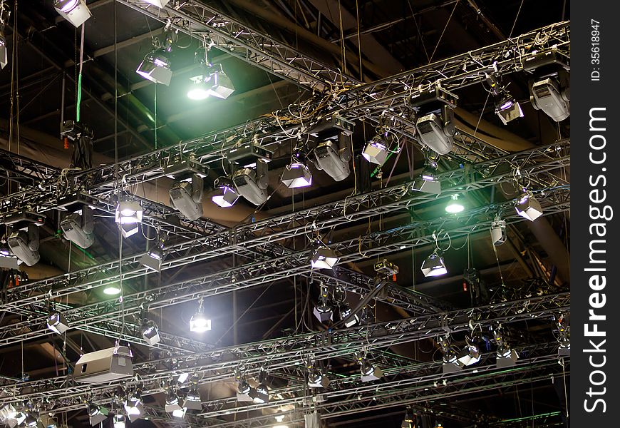 Multiple spotlights on exhibition hall