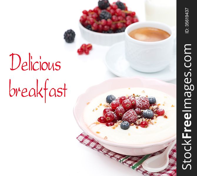 Semolina porridge with fresh berries, nuts and cup of coffee