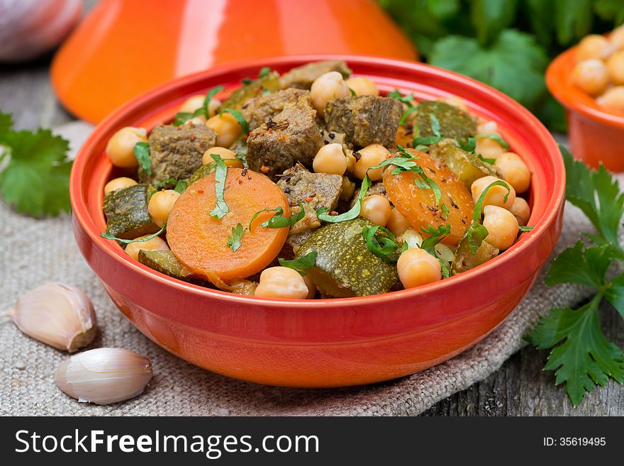 Tagine with beef, vegetables and chickpeas, close-up, horizontal