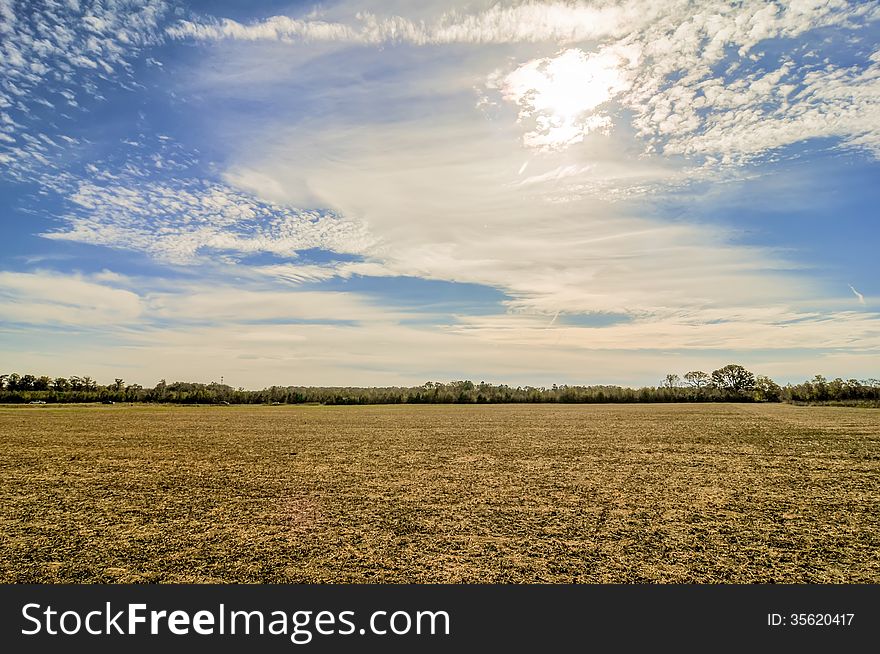 Sunset Over Farm Field