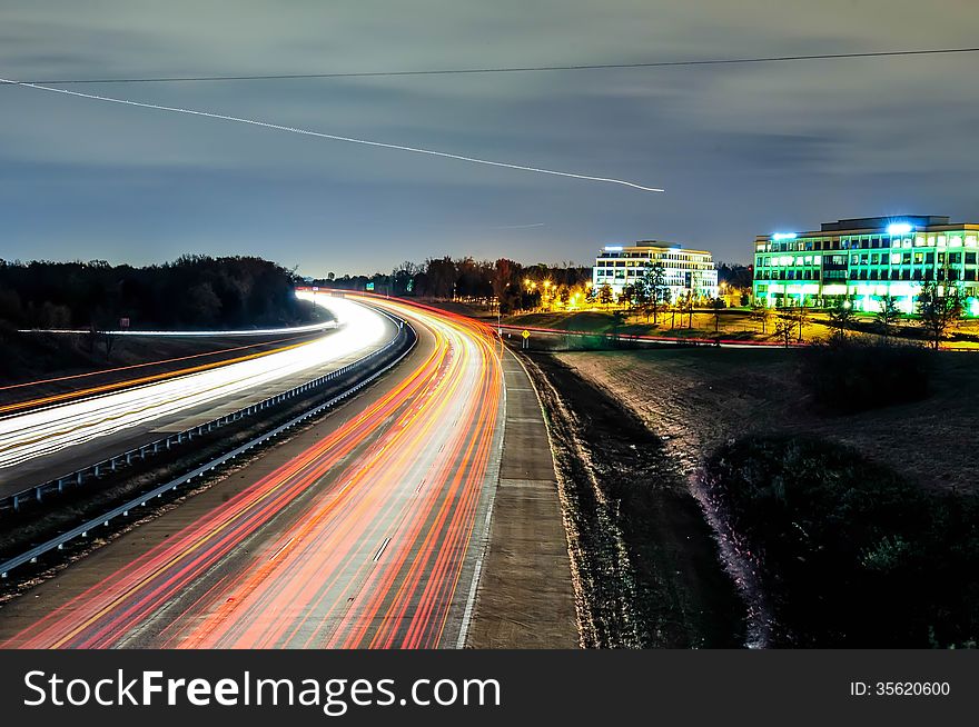 Evening highway and sky traffic in charlotte steele creek