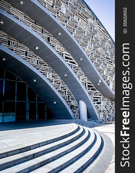 Entrance of modern building, arc stair and art wall. Entrance of modern building, arc stair and art wall