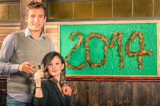 Couple Of Lovers Celebrating New Year 2014 Stock Photos Couple Of Lovers Celebrating New Year 2014 Stock Photos