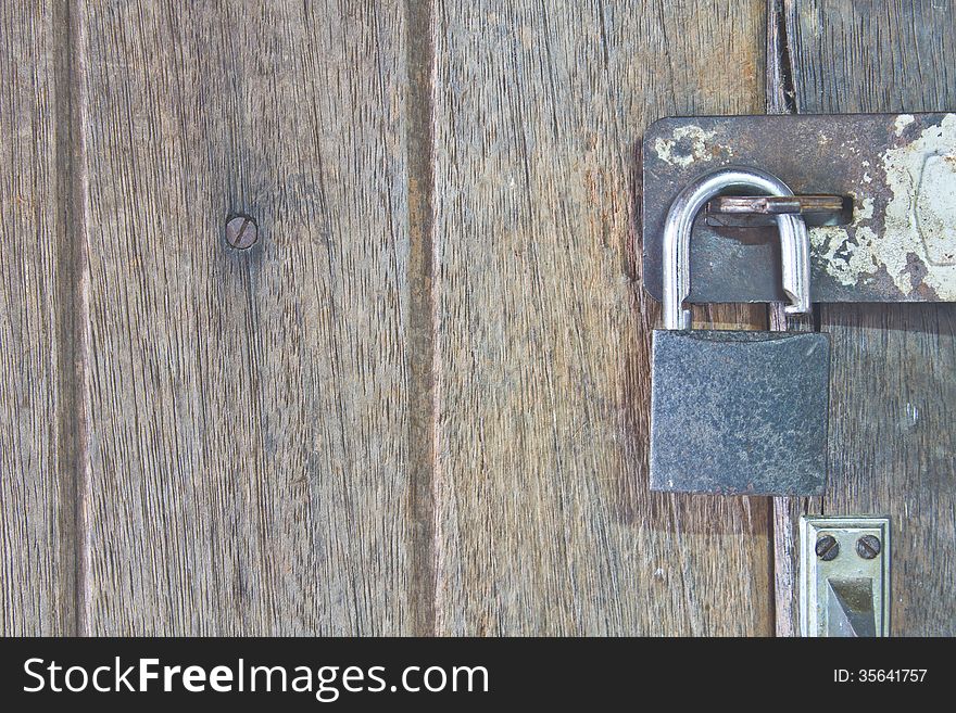 Old padlock on door