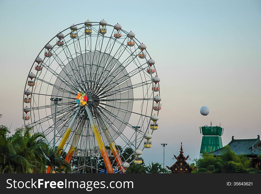 The ferris wheel in the amusement park in Thailand.