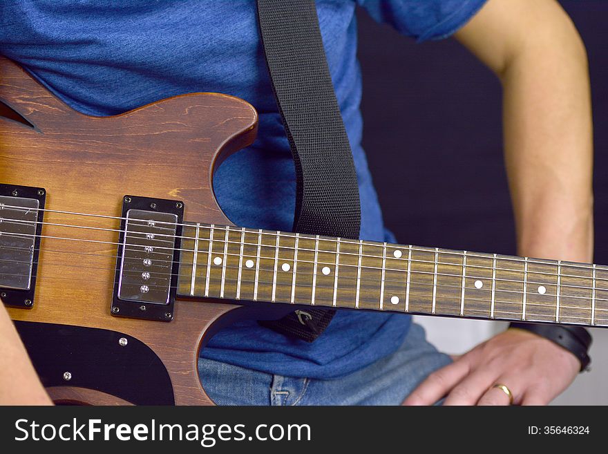 Man and a guitar waiting to start playing