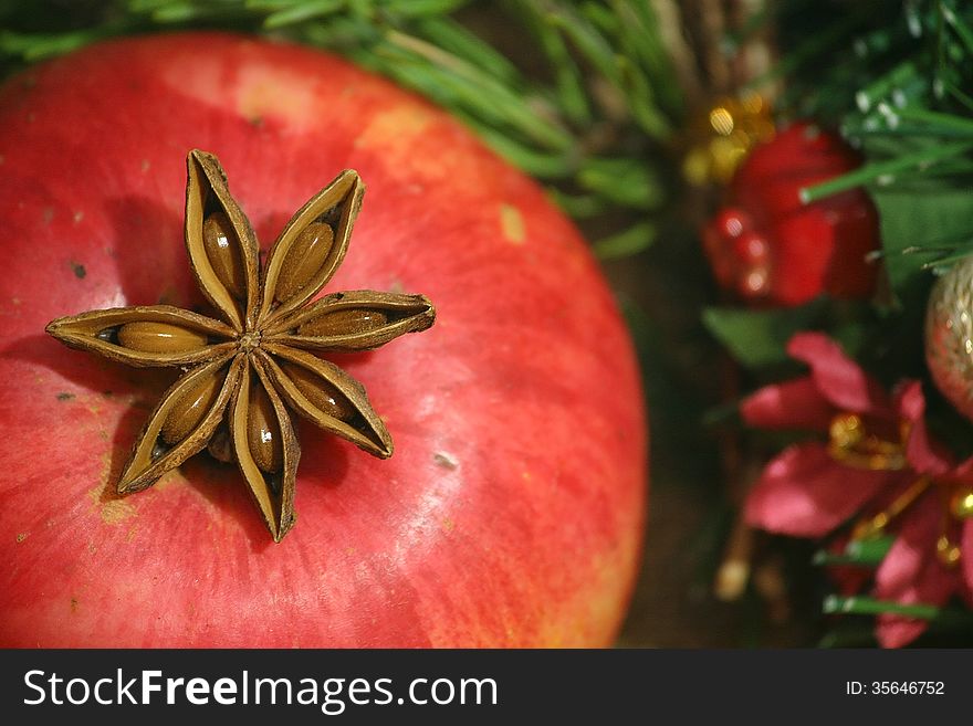 Christmas anice star and red apple