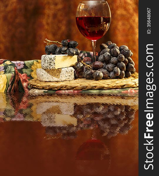 Red wine, grapes and brie cheese. Red wine, grapes and brie cheese