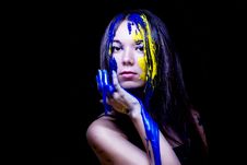 Beauty/fashion Close Up Portrait Of Woman Painted Blue And Yellow On Black Background Stock Photos