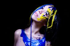 Beauty/fashion Close Up Portrait Of Woman Painted Blue And Yellow On Black Background Royalty Free Stock Photography