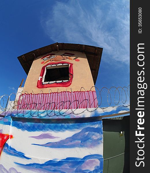 Gatehouse in the wall with paint Face - Amazonia - Brazil. Gatehouse in the wall with paint Face - Amazonia - Brazil