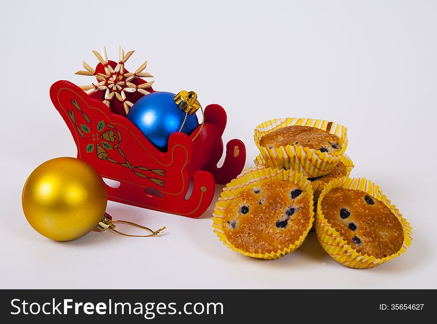 Christmas decoration with snowman and blueberry kakes