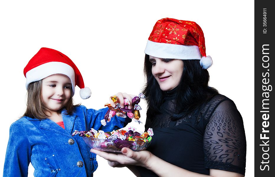 Mom treats her daughter candy in Christmas