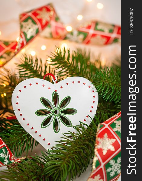 White Christmas decoration on the tree. White Christmas decoration on the tree