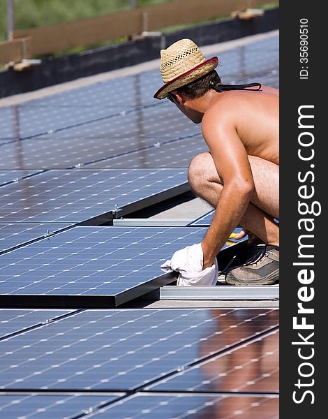 Photovoltaic panels workers in a site