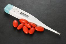 Pills And Thermometer Stock Photo Pills And Thermometer Stock Photo