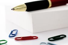 Paperclips, Pen And Post-it Royalty Free Stock Image