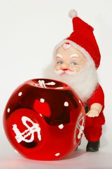 Santa Claus And Red Ball Stock Photos