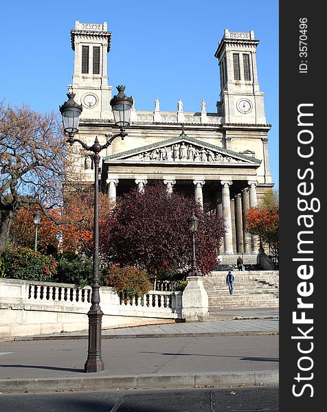 Historic Church in Paris, France against a clear blue Autumn sky. Historic Church in Paris, France against a clear blue Autumn sky