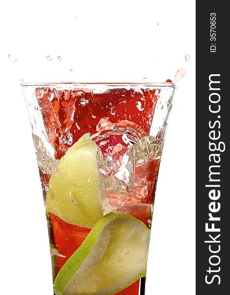 Glass with juice and lemon on the white background