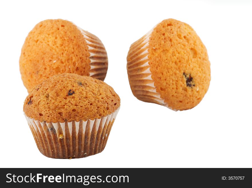 Three muffins isolated on white background. Three muffins isolated on white background