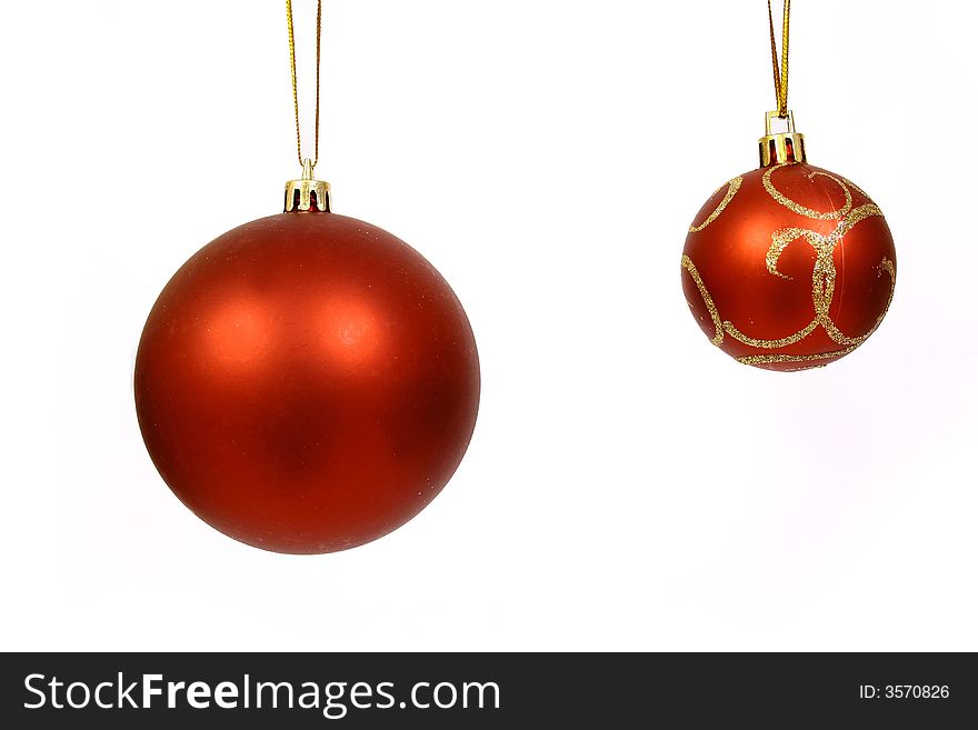 Christmas balls on a white bac