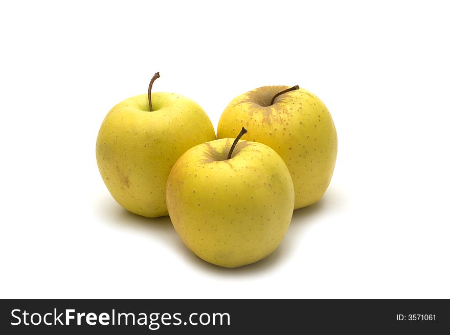 Yellow apples on white background