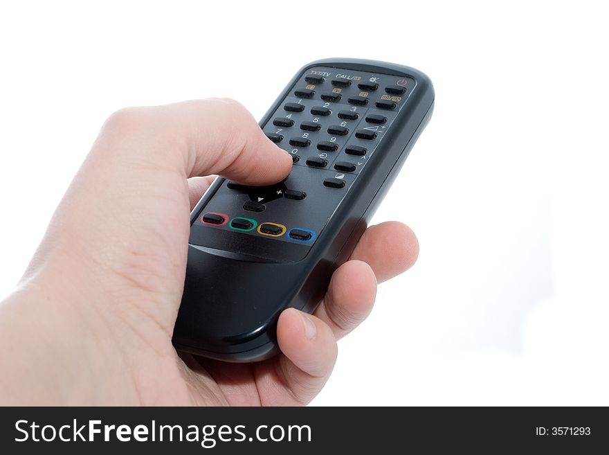 Black Infrared remote control unit in hand on a white background