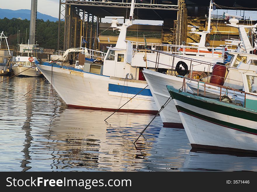 Fishing boats are at rest in an italian port