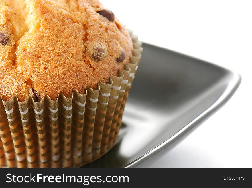 Tasty muffin on white background in closeup. Tasty muffin on white background in closeup