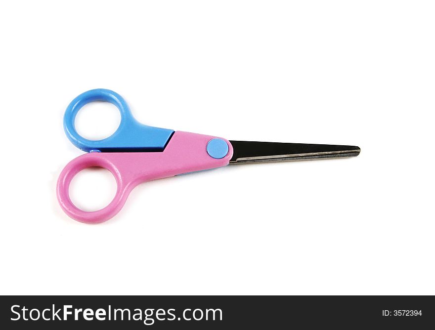Blue and pink scissors isolated on a white background. Blue and pink scissors isolated on a white background.