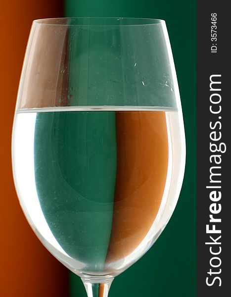 Wineglass in Green and Orange background