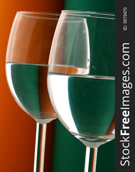 Wineglass in Green and Orange background