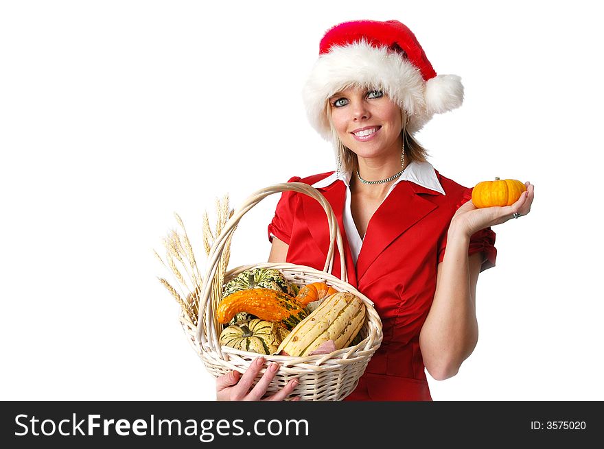 Beautiful Santa girl with pumpkins isolated on white