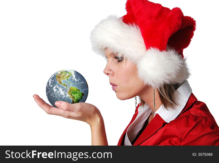 Santa Girl blowing wishes on earth isolated on white