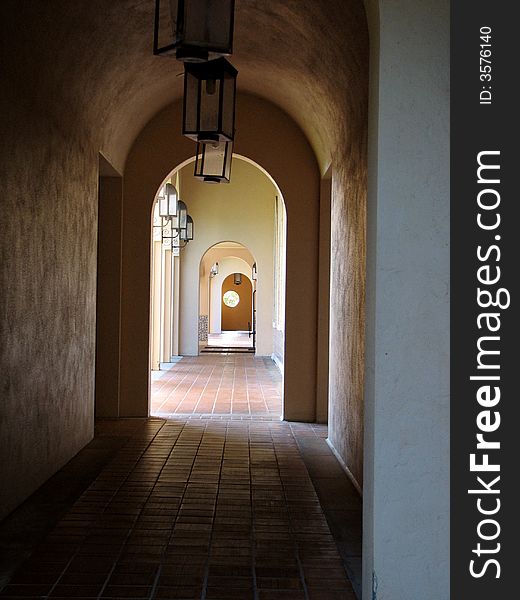 A quiet, long empty hallway.