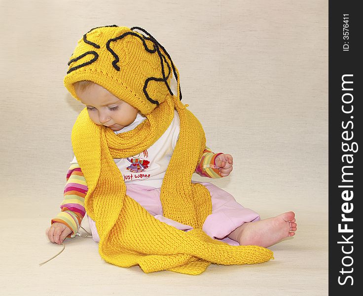 Little Girl And Yellow Cap