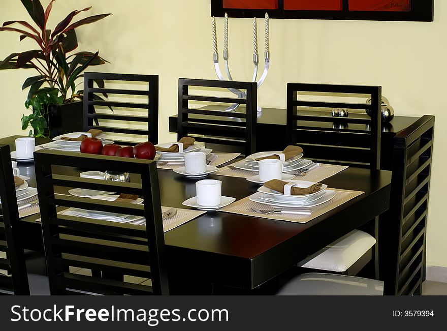 Contemporary diningroom set for a dinnerparty. Contemporary diningroom set for a dinnerparty