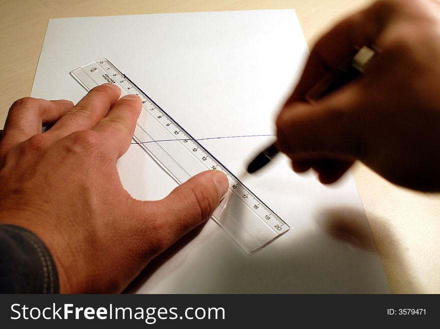 Drawing of a line using a ruler. Drawing of a line using a ruler