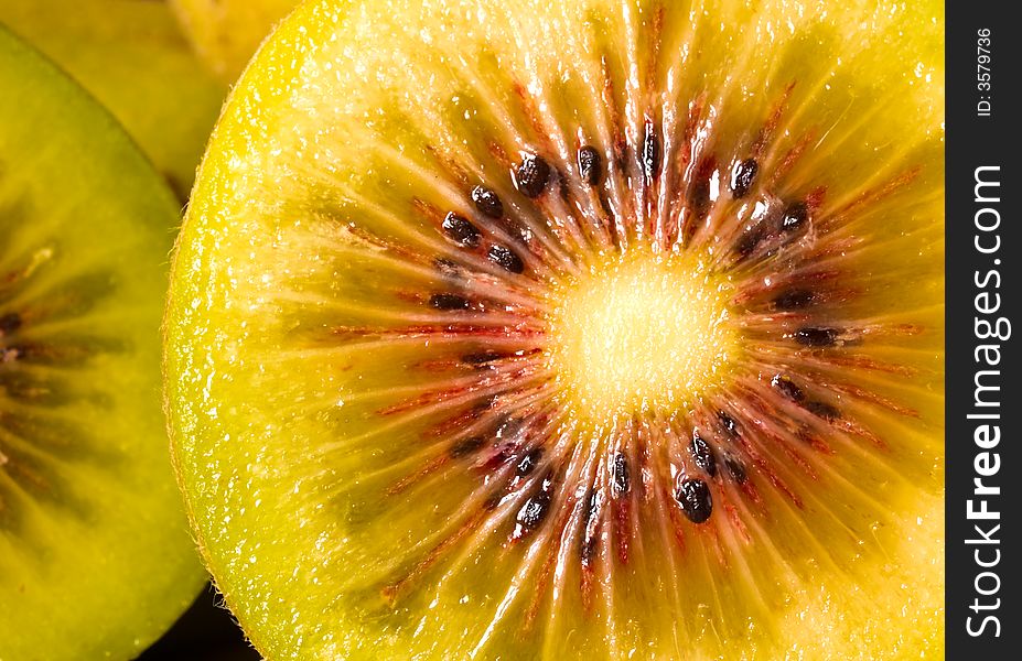 Still life of cut Chinese red kiwifruit in the morning light