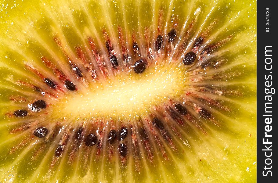 Still life of cut Chinese red kiwifruit in the morning light