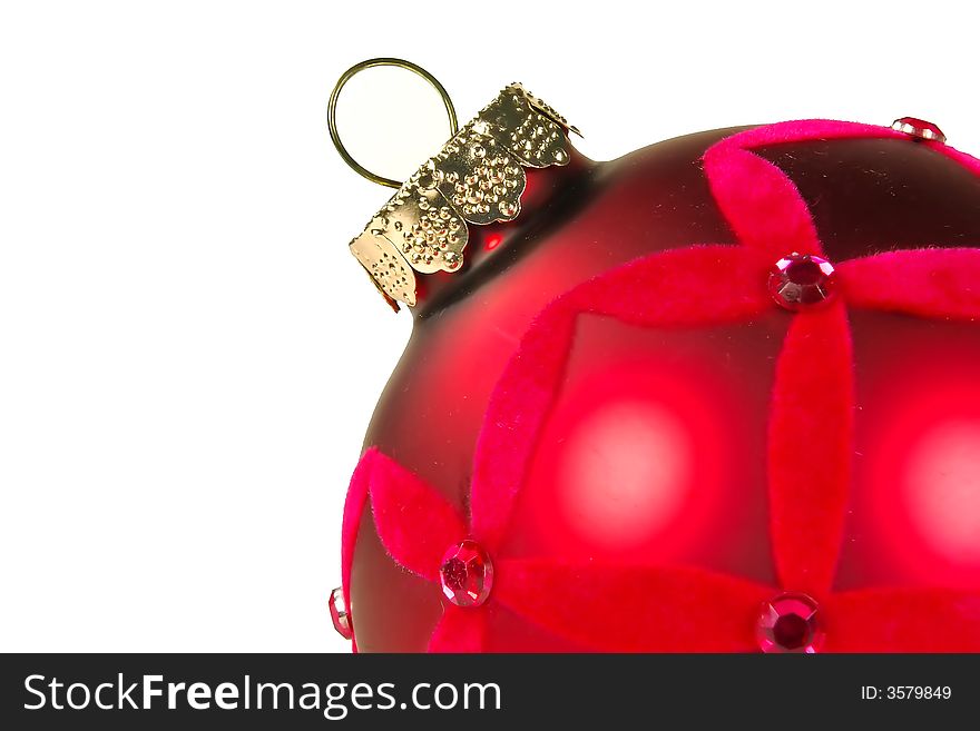 Trendy red christmas tree ornament leaning to one side. Trendy red christmas tree ornament leaning to one side