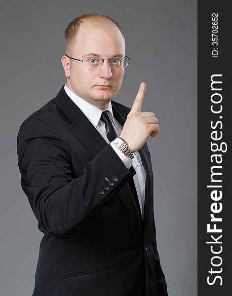 Businessman showing sign of attentions