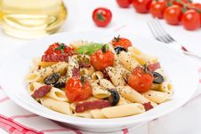 Pasta With Sausage, Cherry Tomatoes And Olives On The Plate Royalty Free Stock Photography Pasta With Sausage, Cherry Tomatoes And Olives On The Plate Royalty Free Stock Photography
