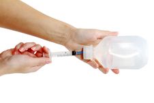 Syringe And Vial. Filling Syringe From Medicine Vial Isolated O Stock Image