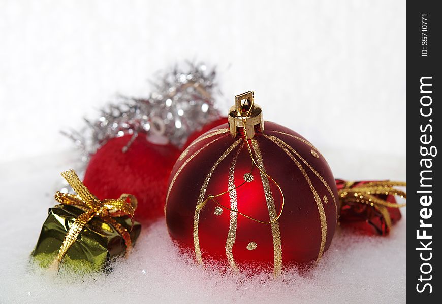 Christmas ornaments over a white background. Christmas ornaments over a white background