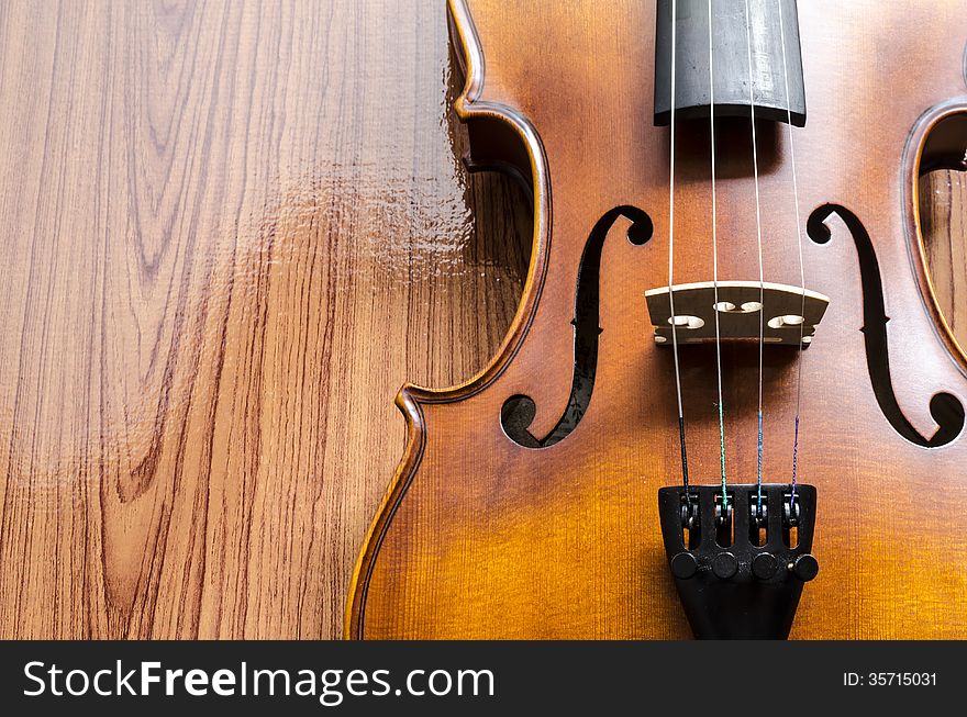 Violin On Wood Background