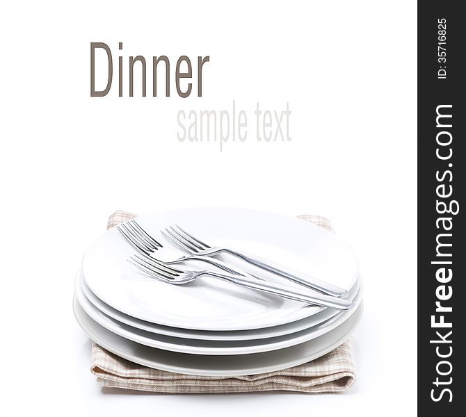 Tableware for dinner - plates and forks, isolated on white