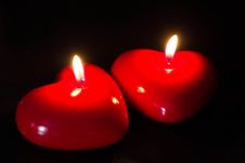 Two Red Candles In The Form Of Heart Royalty Free Stock Photography