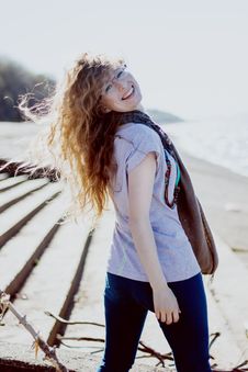 Happy Woman With Glasses And Curly Hair On Bright Sunny Background Royalty Free Stock Photography Happy Woman With Glasses And Curly Hair On Bright Sunny Background Royalty Free Stock Photography